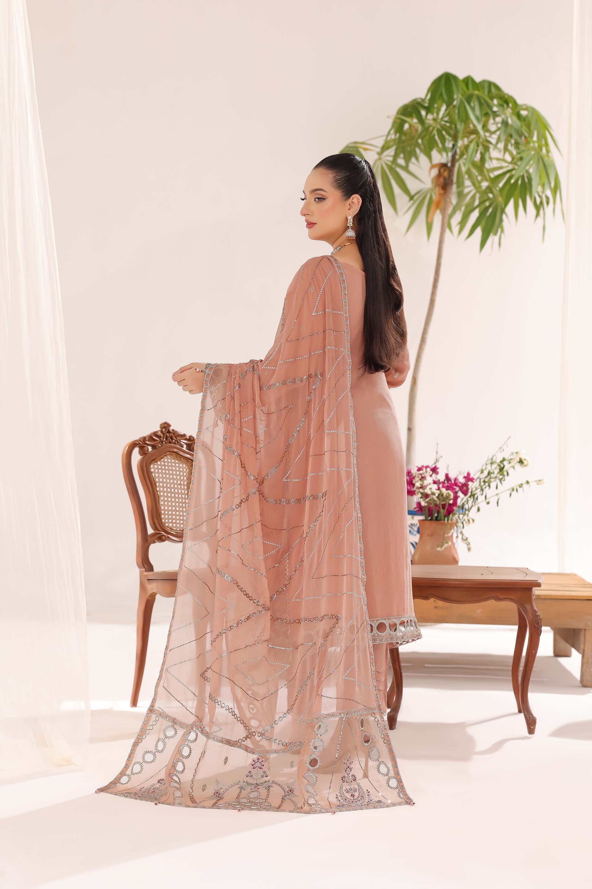 Sahiba: Warm Muted Peach suit with Intricate Silver Threadwork