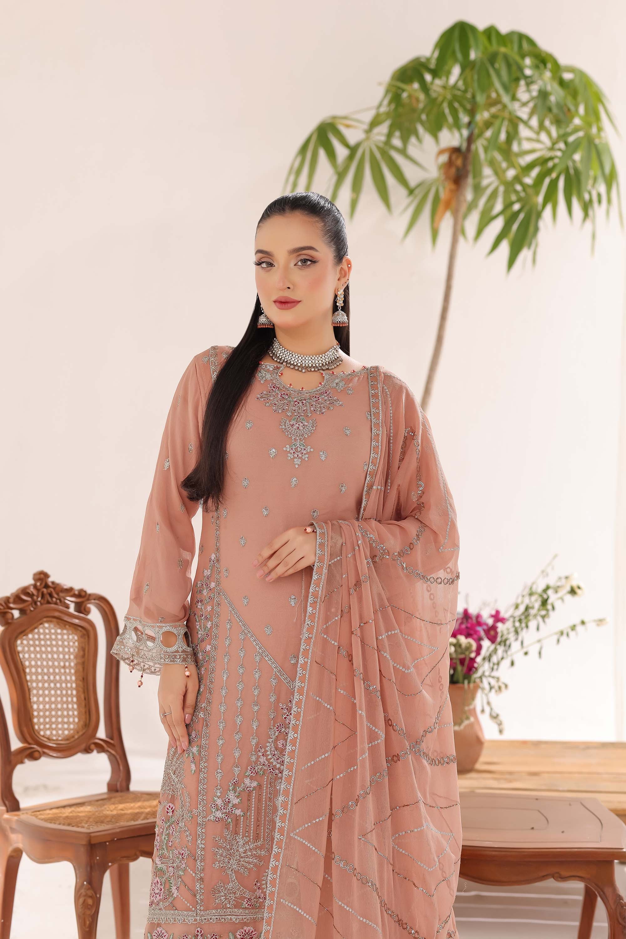 Sahiba: Warm Muted Peach suit with Intricate Silver Threadwork