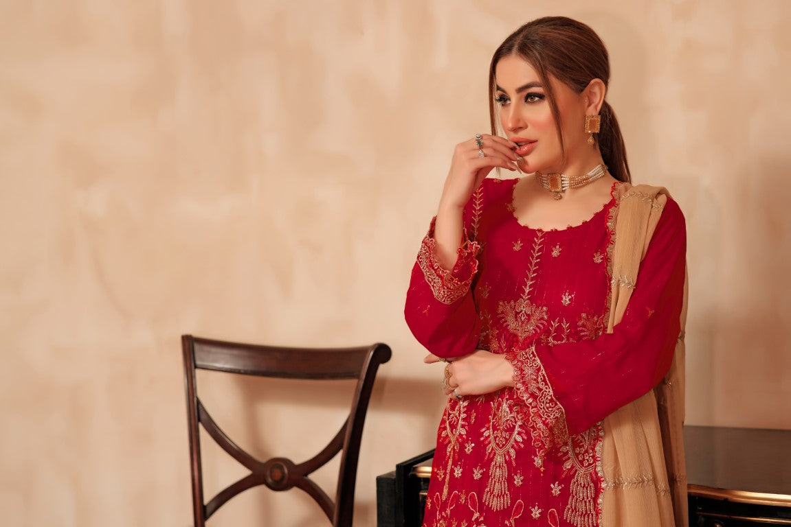 Red 3 piece Semi stitched suit. All over shirt with Heavy Dupatta.