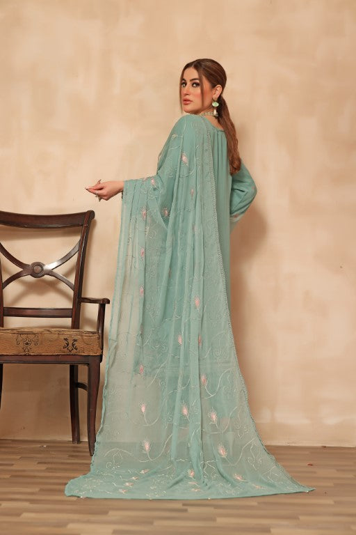 Greenish 3 piece Semi stitched suit. All over shirt with Heavy Dupatta.