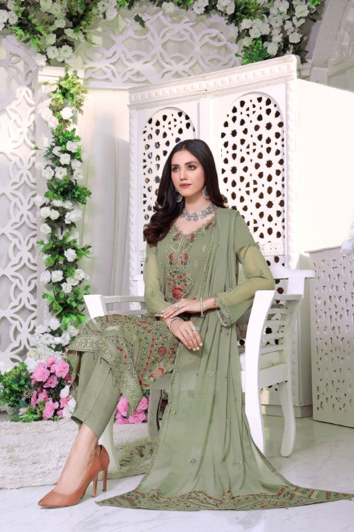 Dusty green embroidered 3 piece suit tussels and stylish embroidered dupatta.