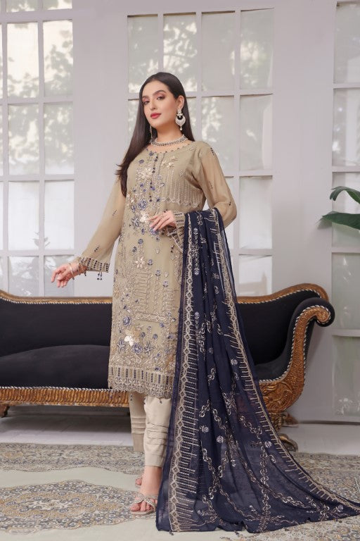 Royal skin 3 piece suit with contrast blue Jaal dupatta