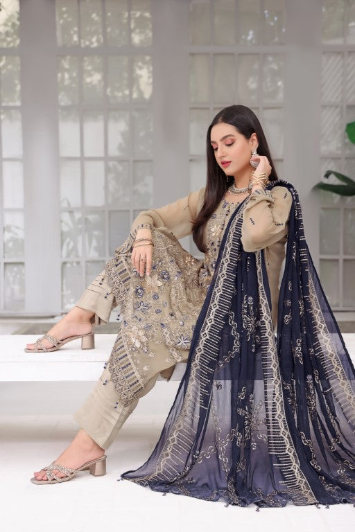 Royal skin 3 piece suit with contrast blue Jaal dupatta