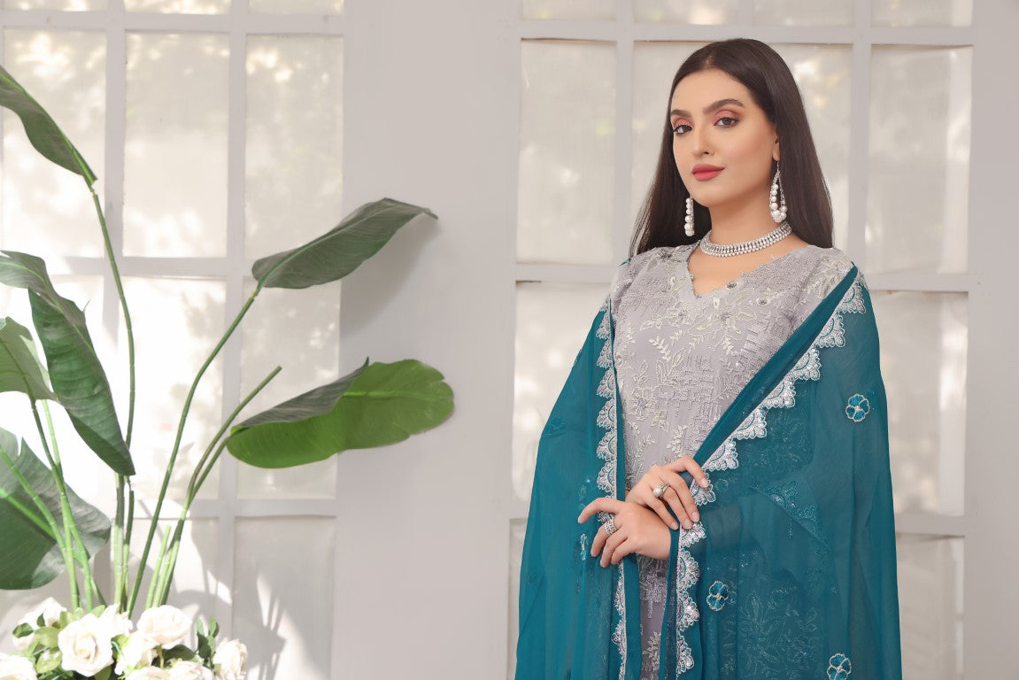 Shiny Silver Embroidered chiffon suit contrast Royal blue dupatta.