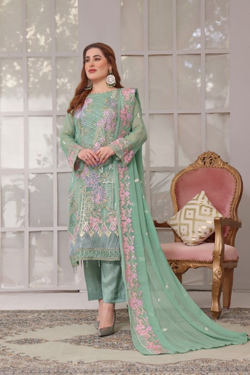 Cool green 3 piece multi colored embroidered suit heavy dupatta.