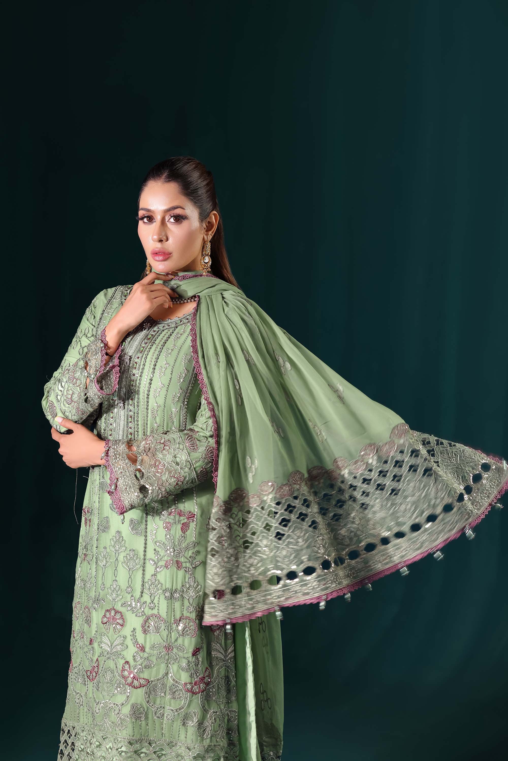 Naqsh: Pastel Pistachio Green Suit with Contrast Thread Accents