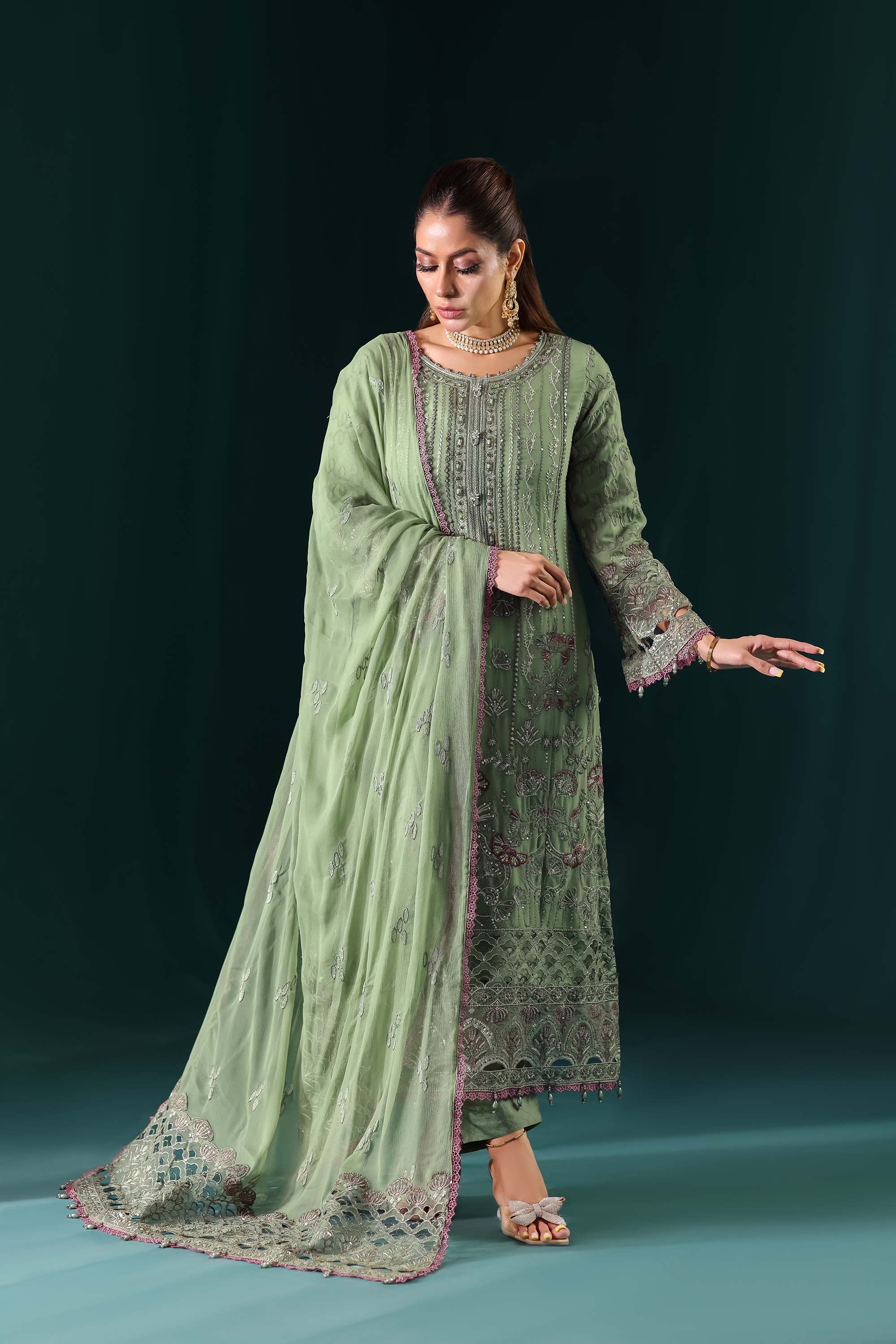 Naqsh: Pastel Pistachio Green Suit with Contrast Thread Accents