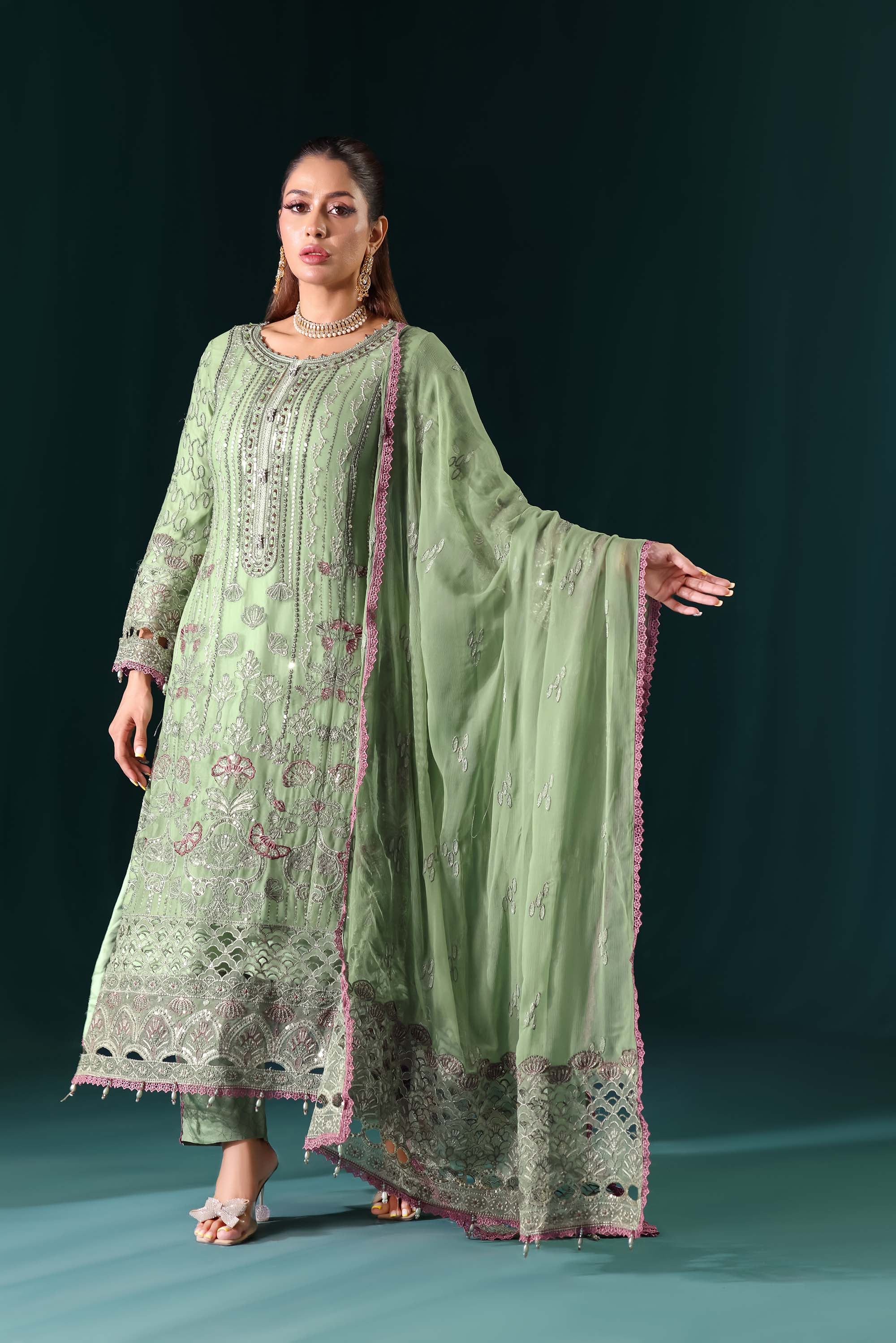 Naqsh: Pastel Pistachio Green Suit with Contrast Thread Accents