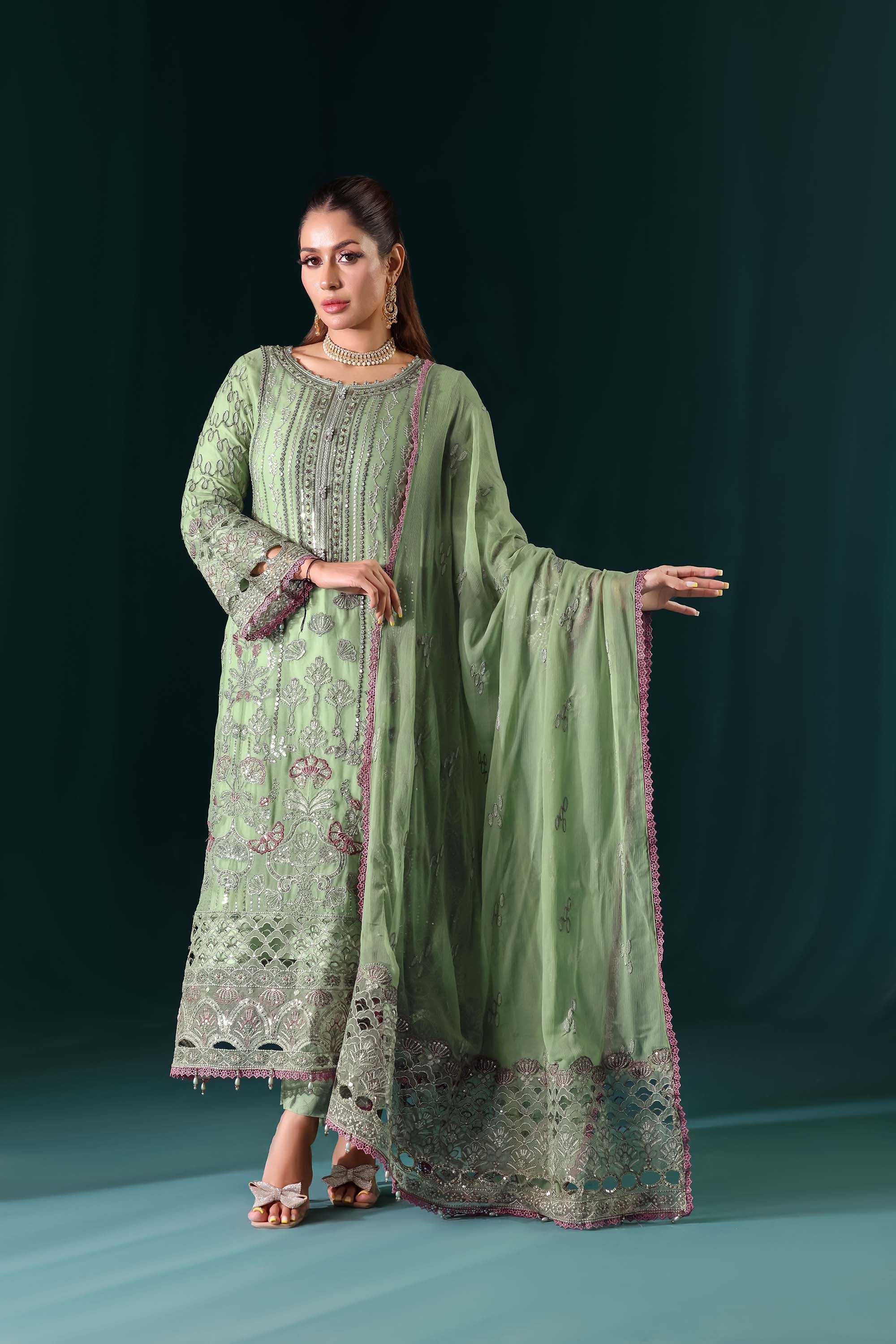 Naqsh: Pastel Pistachio Green Suit with Contrast Thread Accents