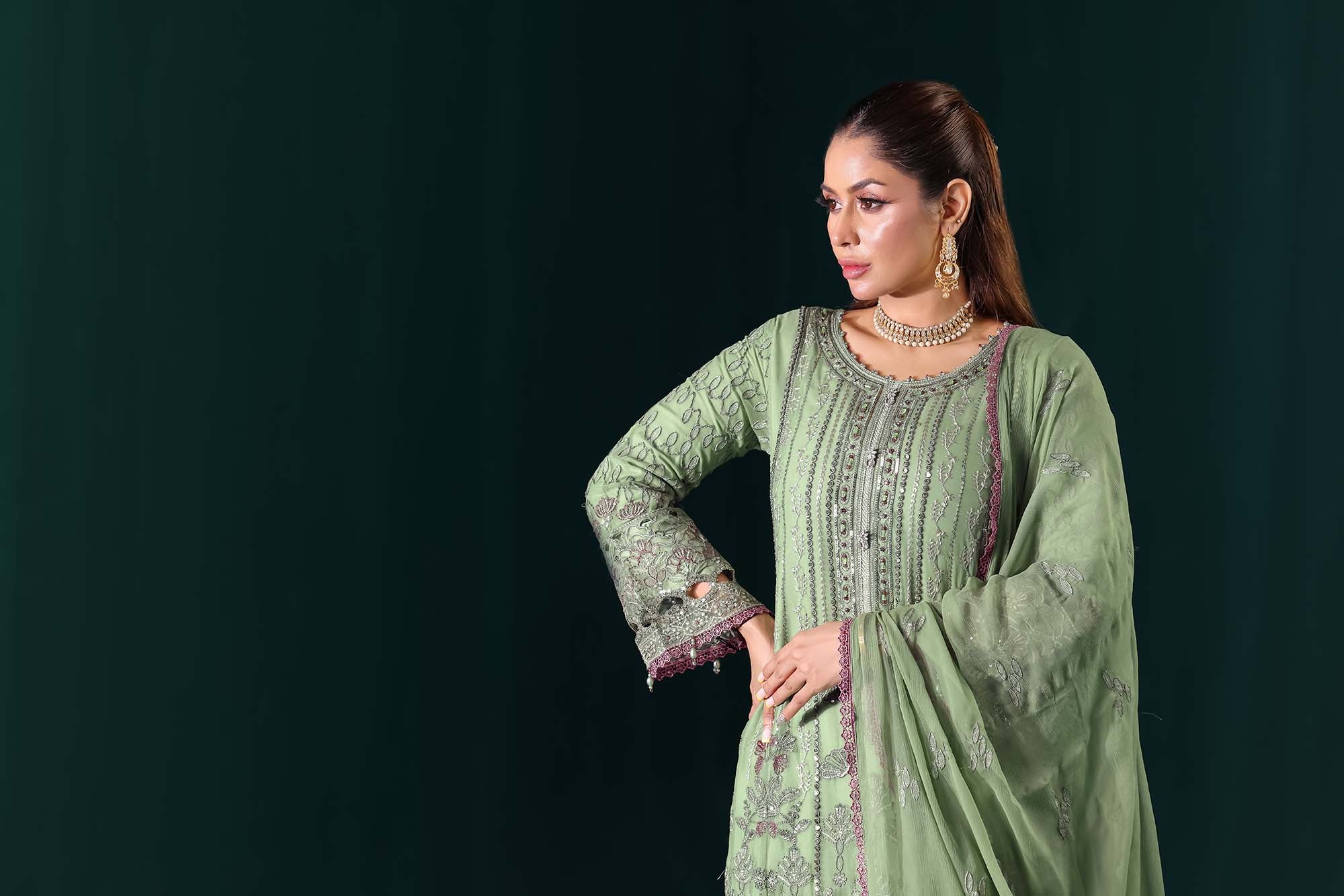 Naqsh: Pastel Pistachio Green Suit with Contrast Thread Accents
