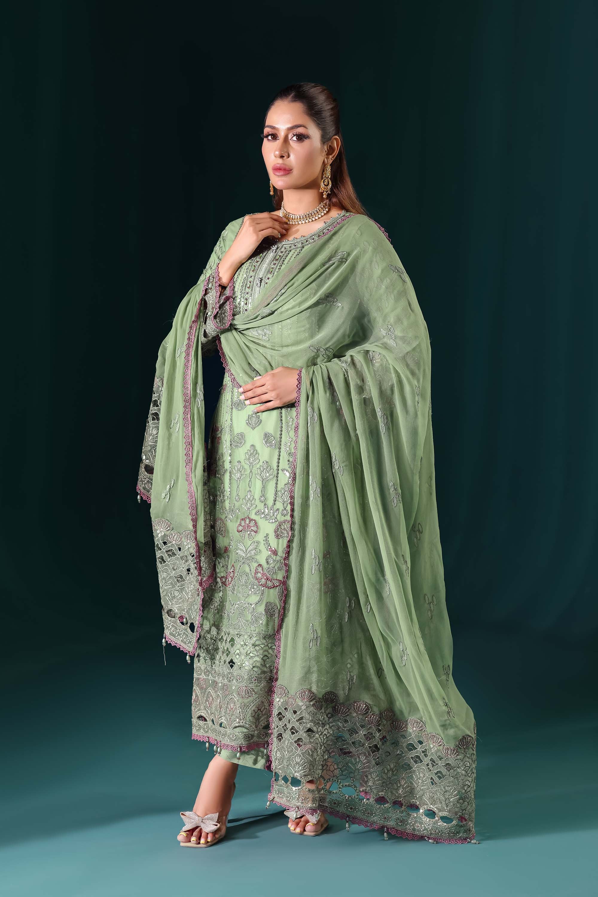 Naqsh: Pastel Pistachio Green Suit with Contrast Thread Accents