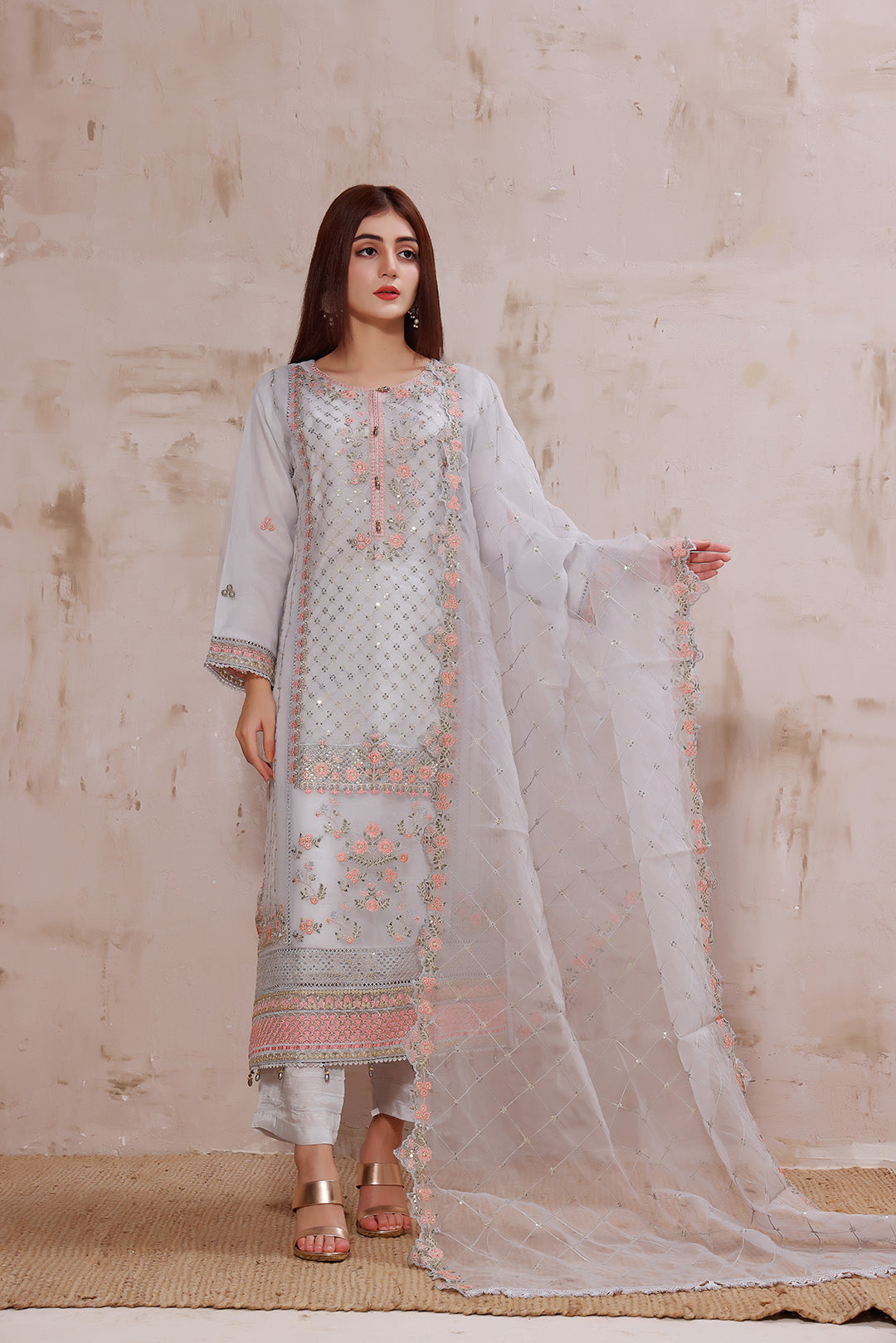 Crystal grey multi color embroidered stitched organza suit.